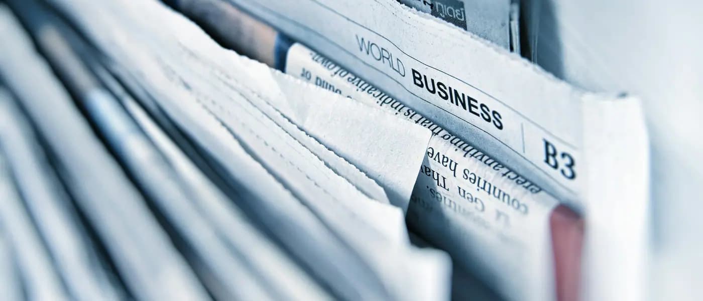 Stack of newspapers for astrologer PR