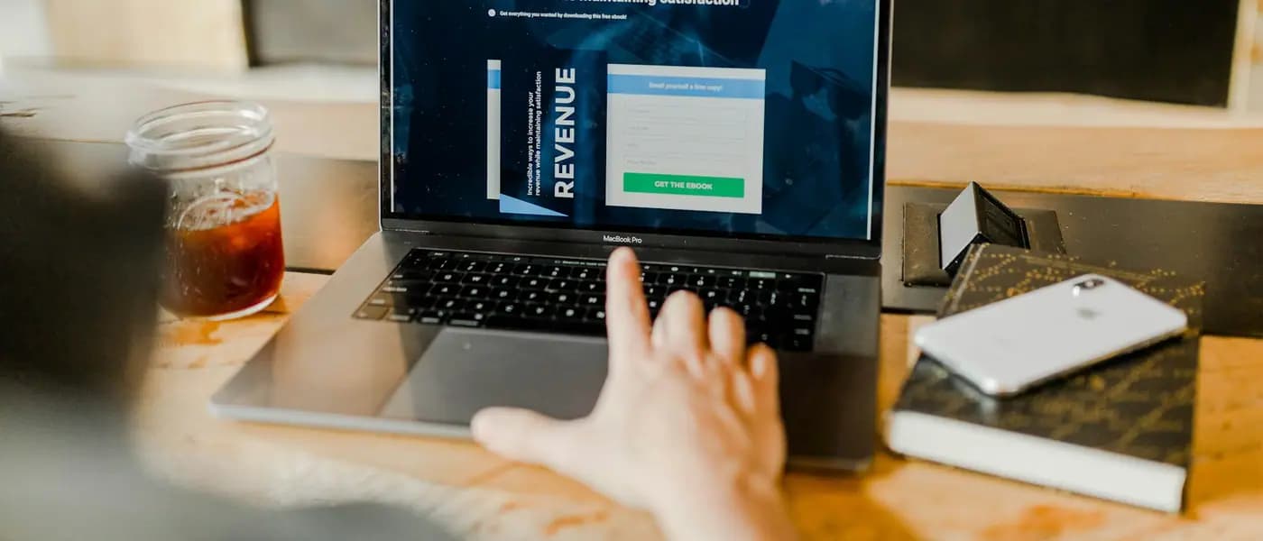 Laptop showing a business landing page for Google Ads management services