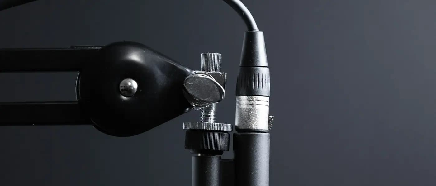 Boom microphone in a podcast studio for podcast and interview placements