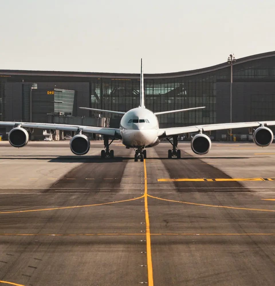 Aeroplane on an airport apron representing visa PR services